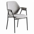 Metal framed dining chair with gray fabric upholstery and arms 45 x 55 x 80cm